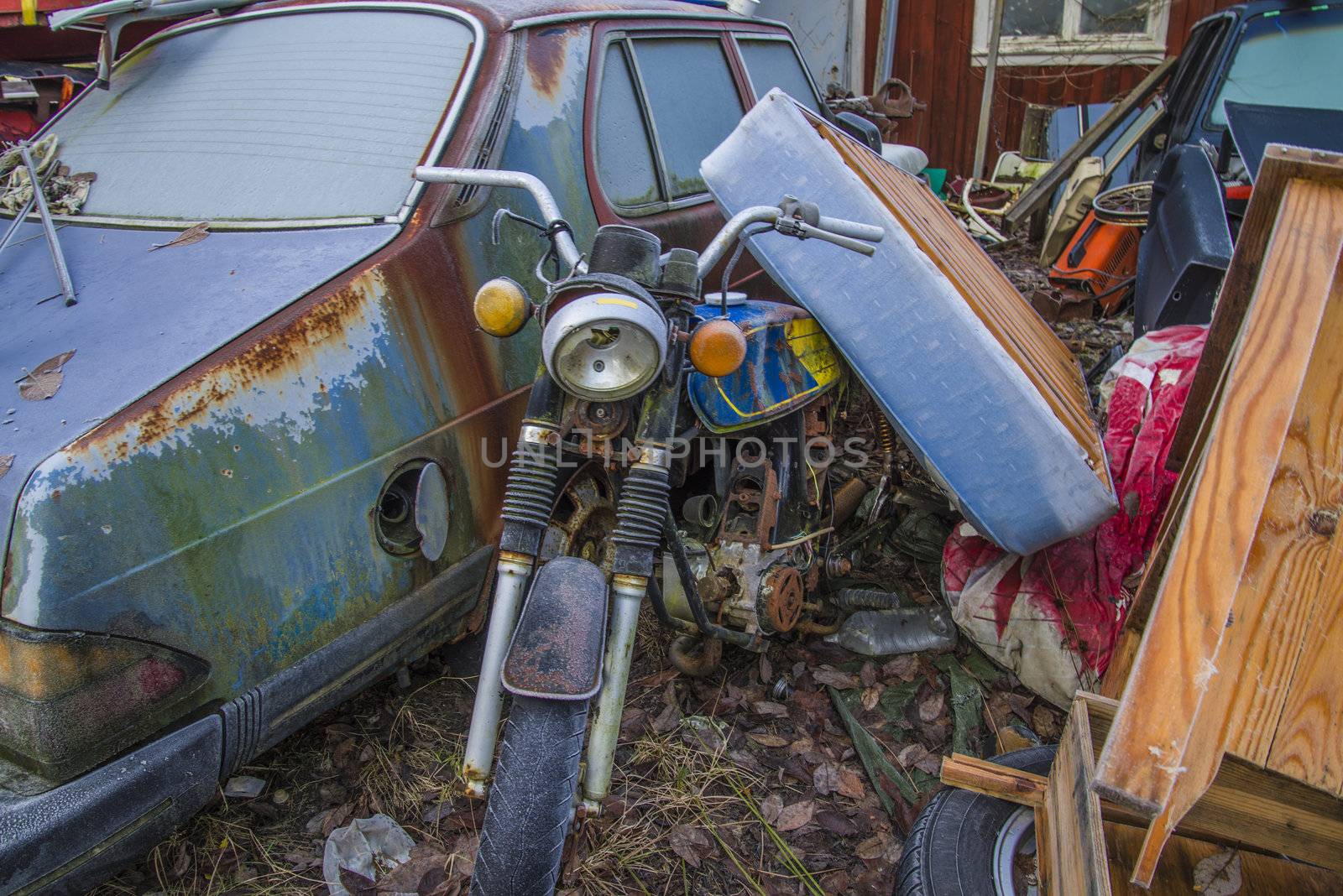 the pictures are shot in january 2013 and shows different car wreck on a scrapyard for cars somewhere in sweden