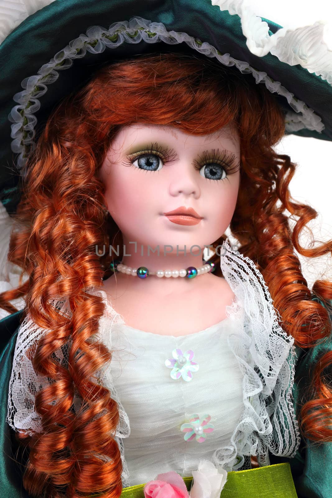 Redhead doll portrait in medieval dress and hat
