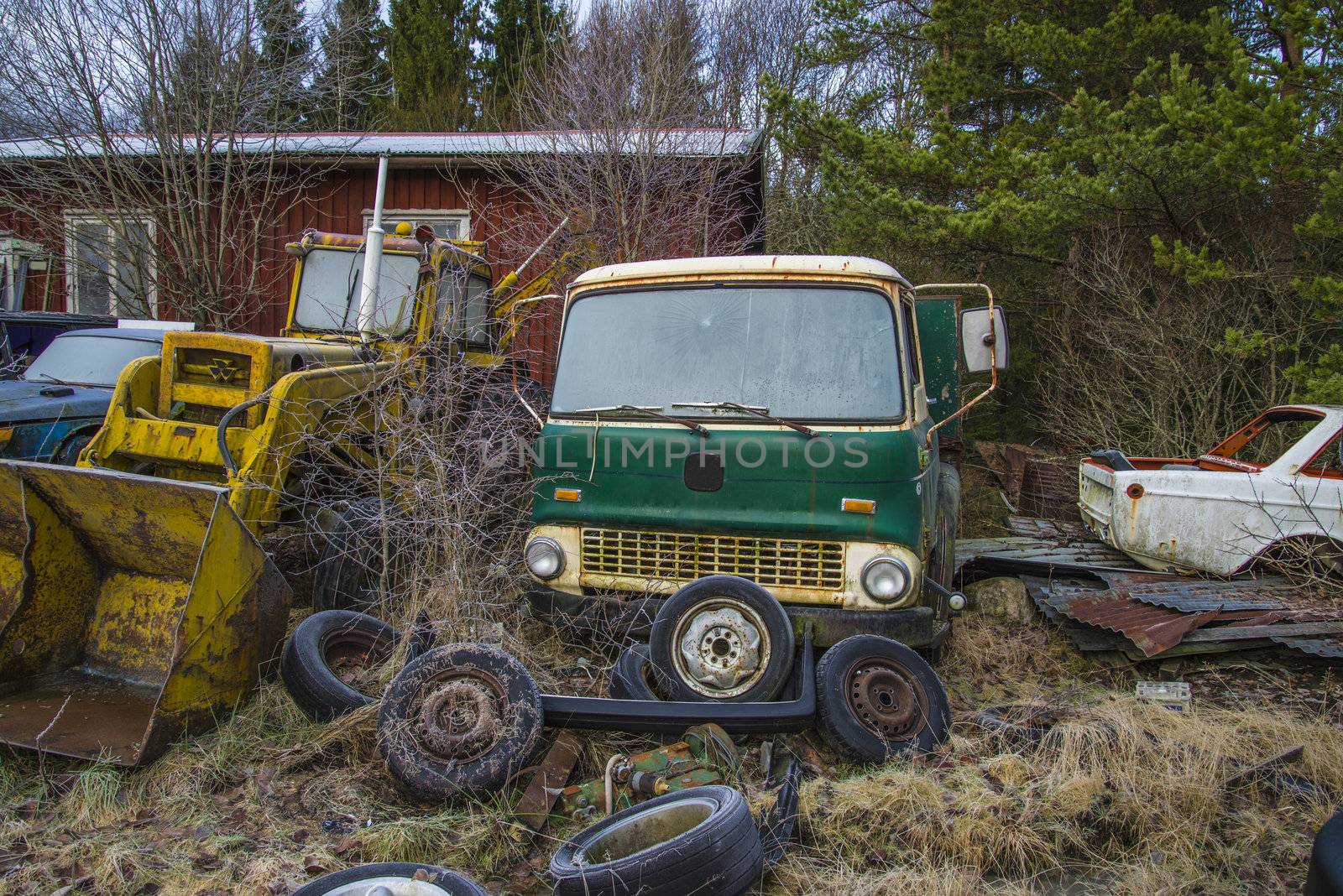 the pictures are shot in january 2013 and shows different car wreck on a scrapyard for cars somewhere in sweden