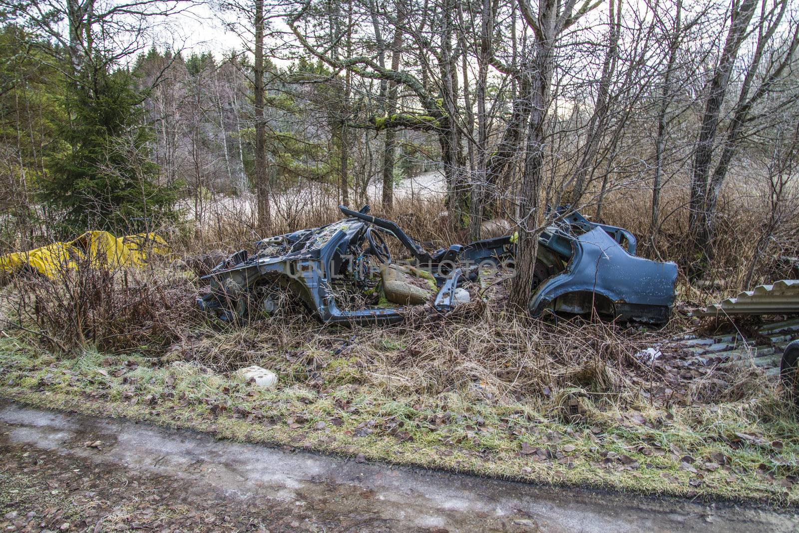 the pictures are shot in january 2013 and shows different car wreck on a scrapyard for cars somewhere in sweden