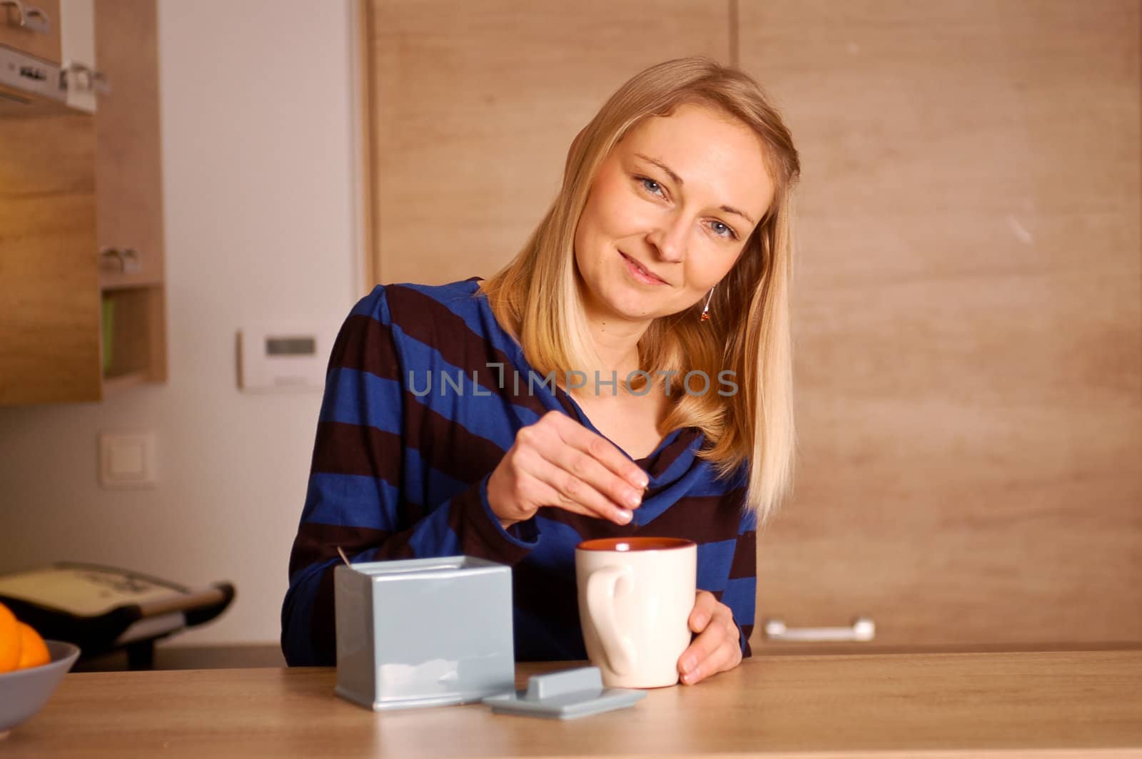 Young woman enjoying her tea break