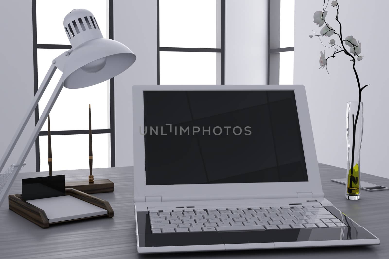 laptop and flower in vase on table in modern cubicle by Serp
