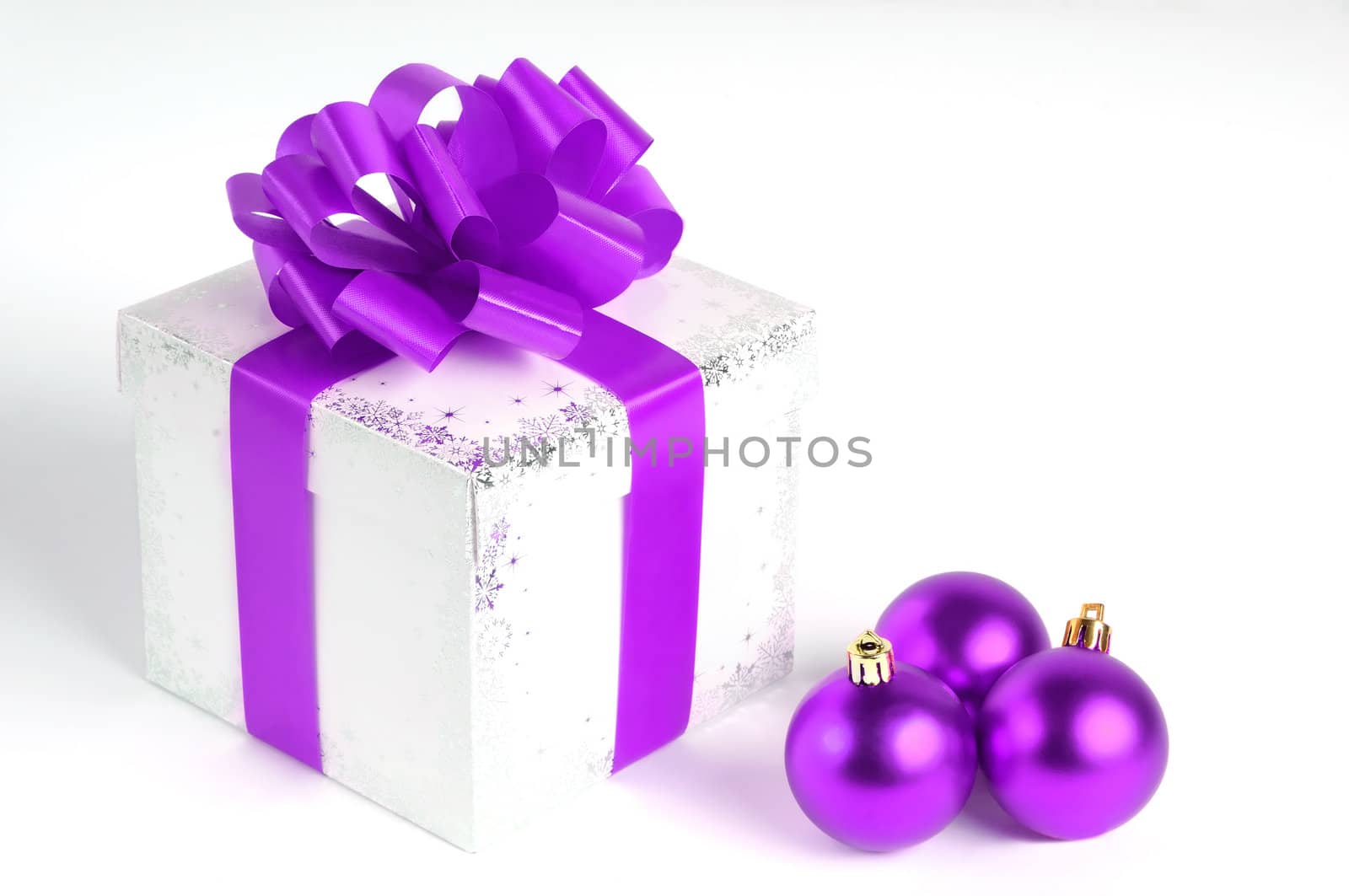 New year gift box isolated on white with Christmas balls, purple
