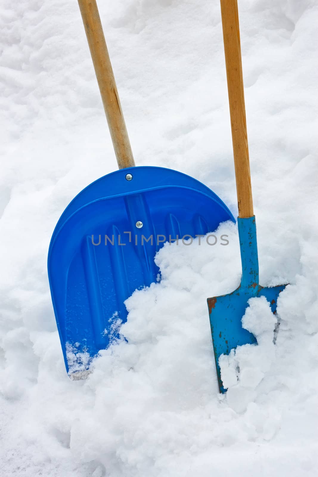 Two Shovels In The Snow Heap by qiiip