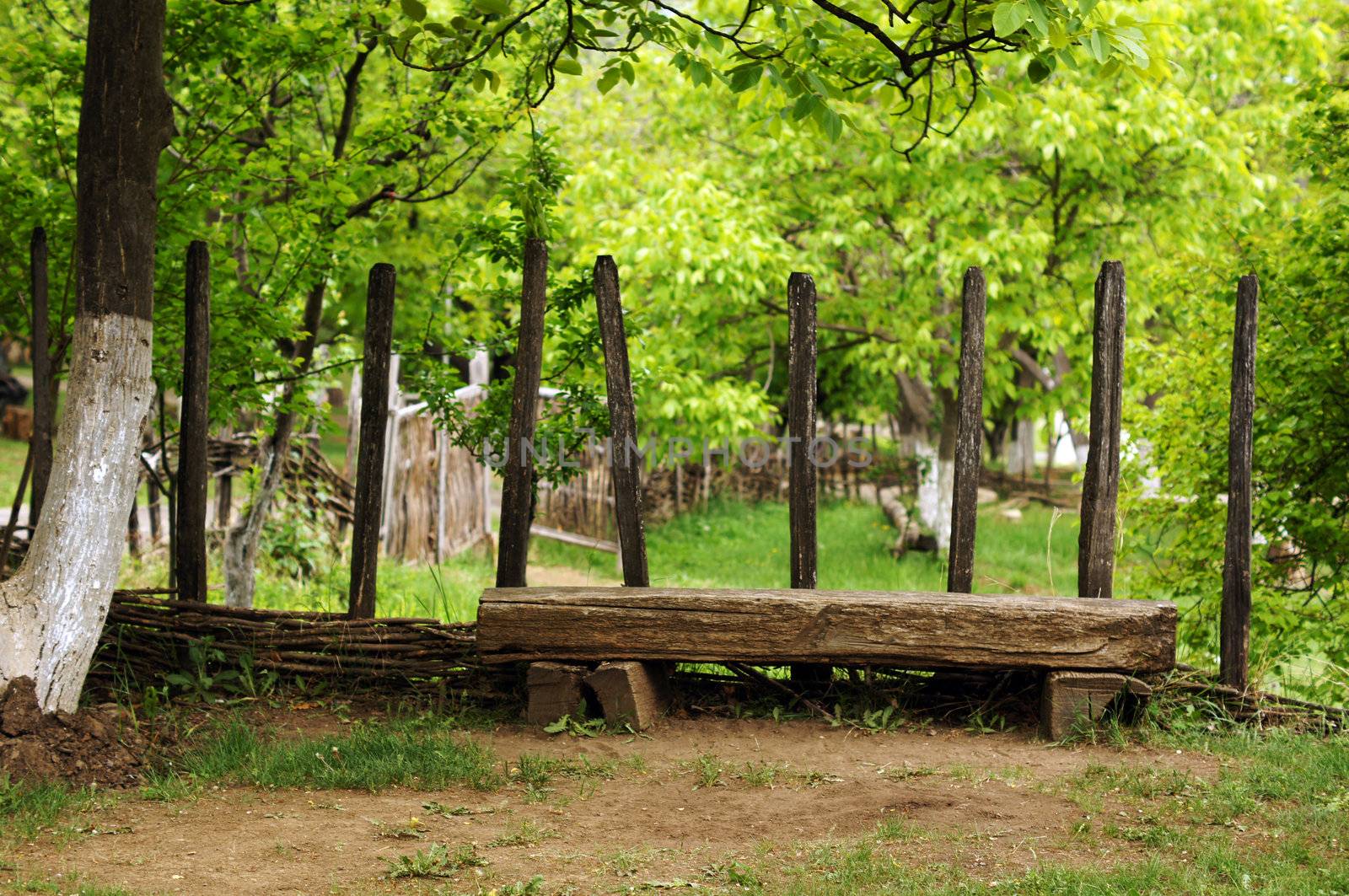 garden bench in rural landscape