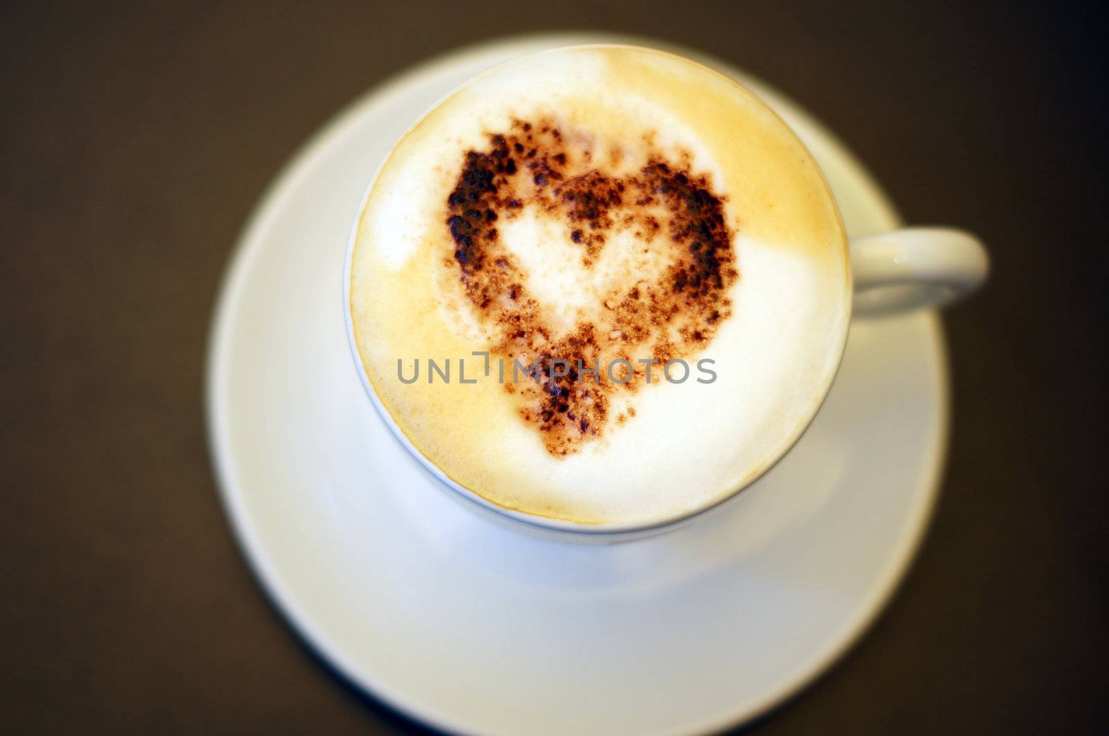 Cup of cappuccino with heart