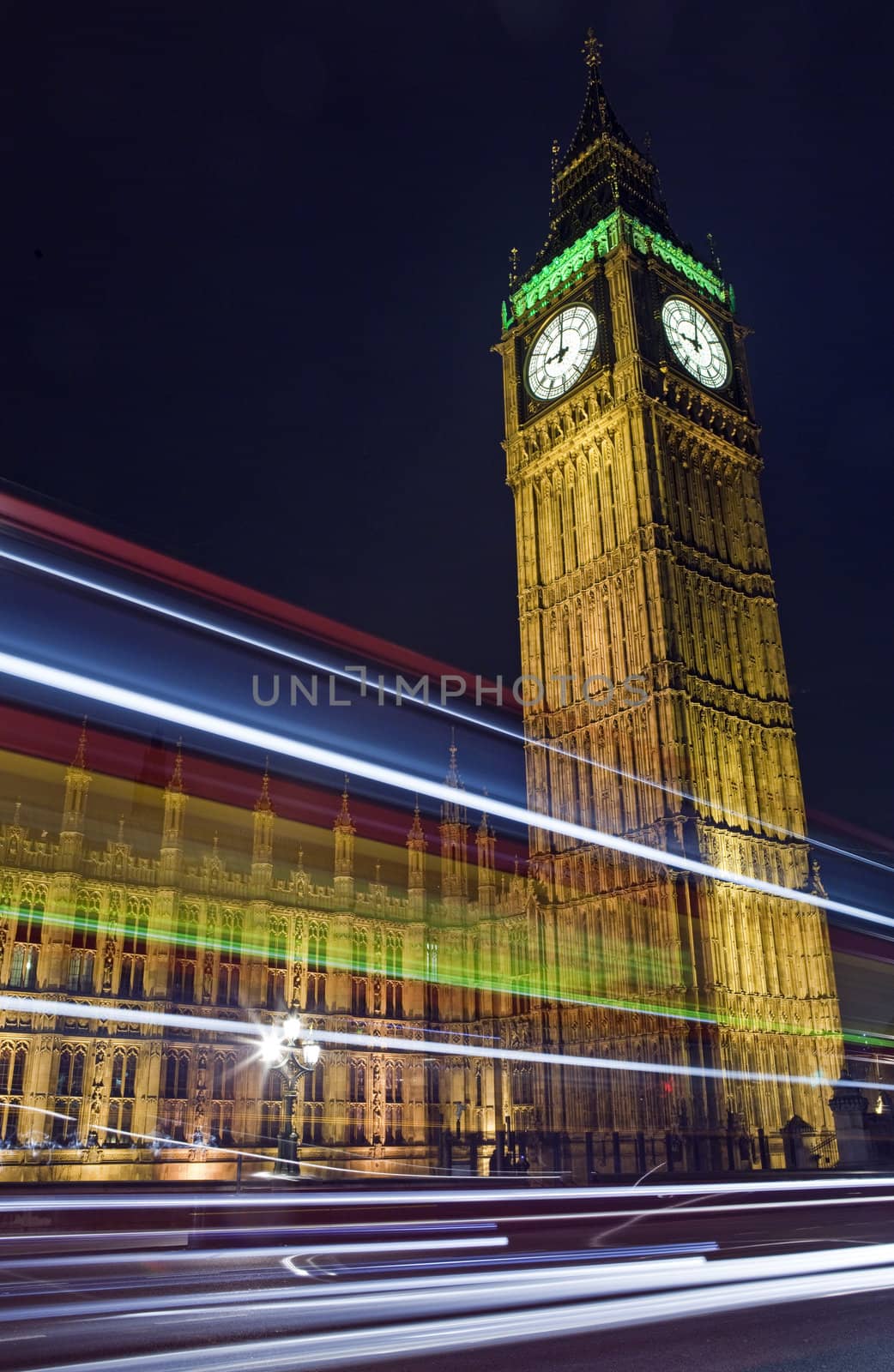 Light Trails of a London Bus Passing the Houses of Parliament.