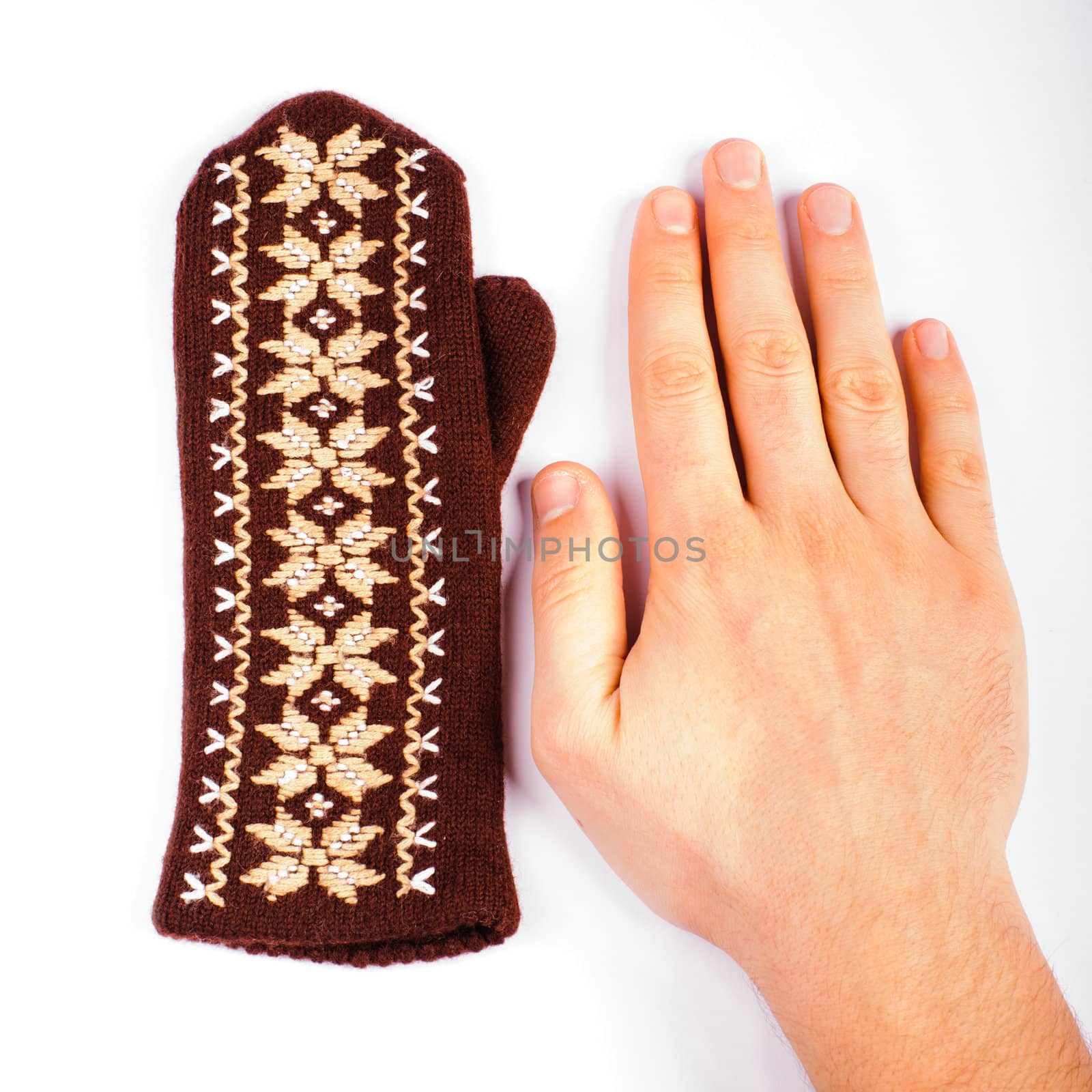 Brown mitten an hand by nvelichko