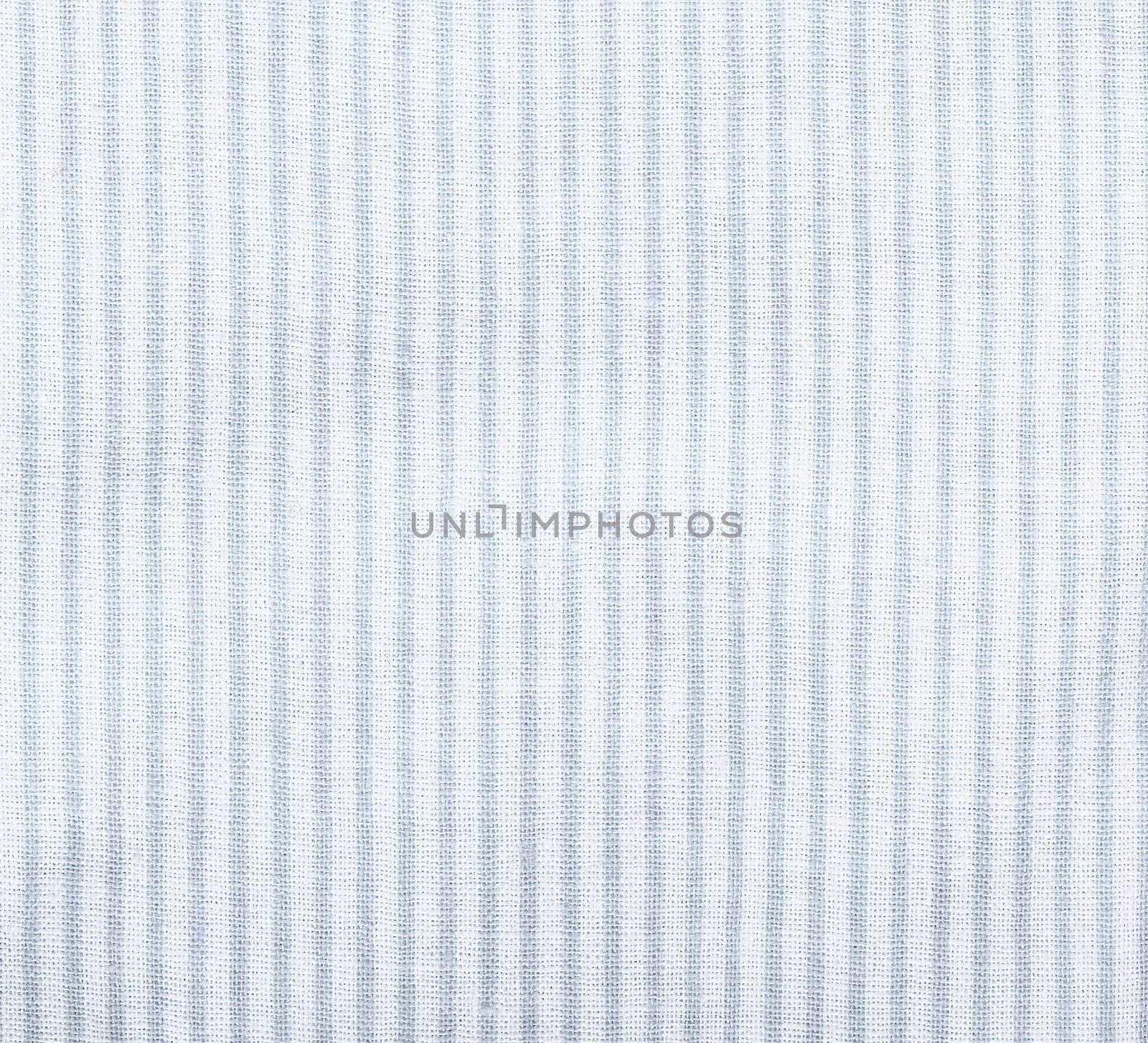 White striped fabric texture. Clothes background. Close up