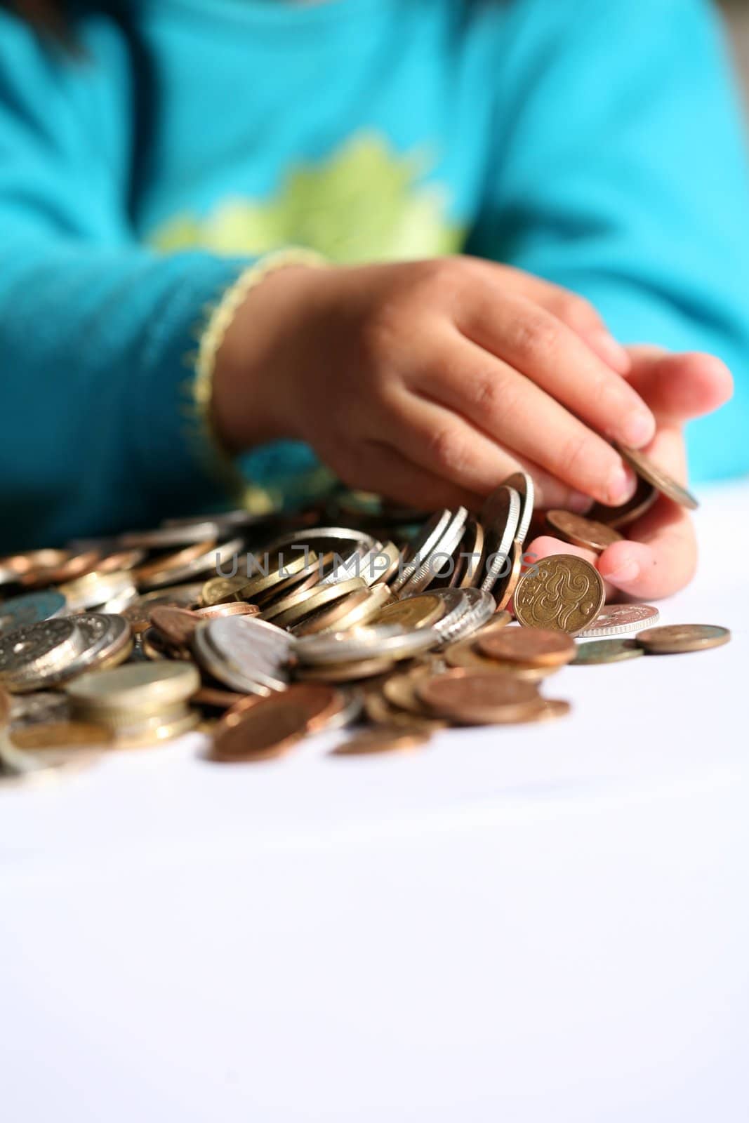 Child playing with money