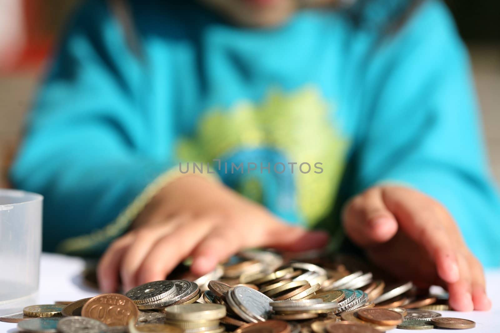 Child playing with money