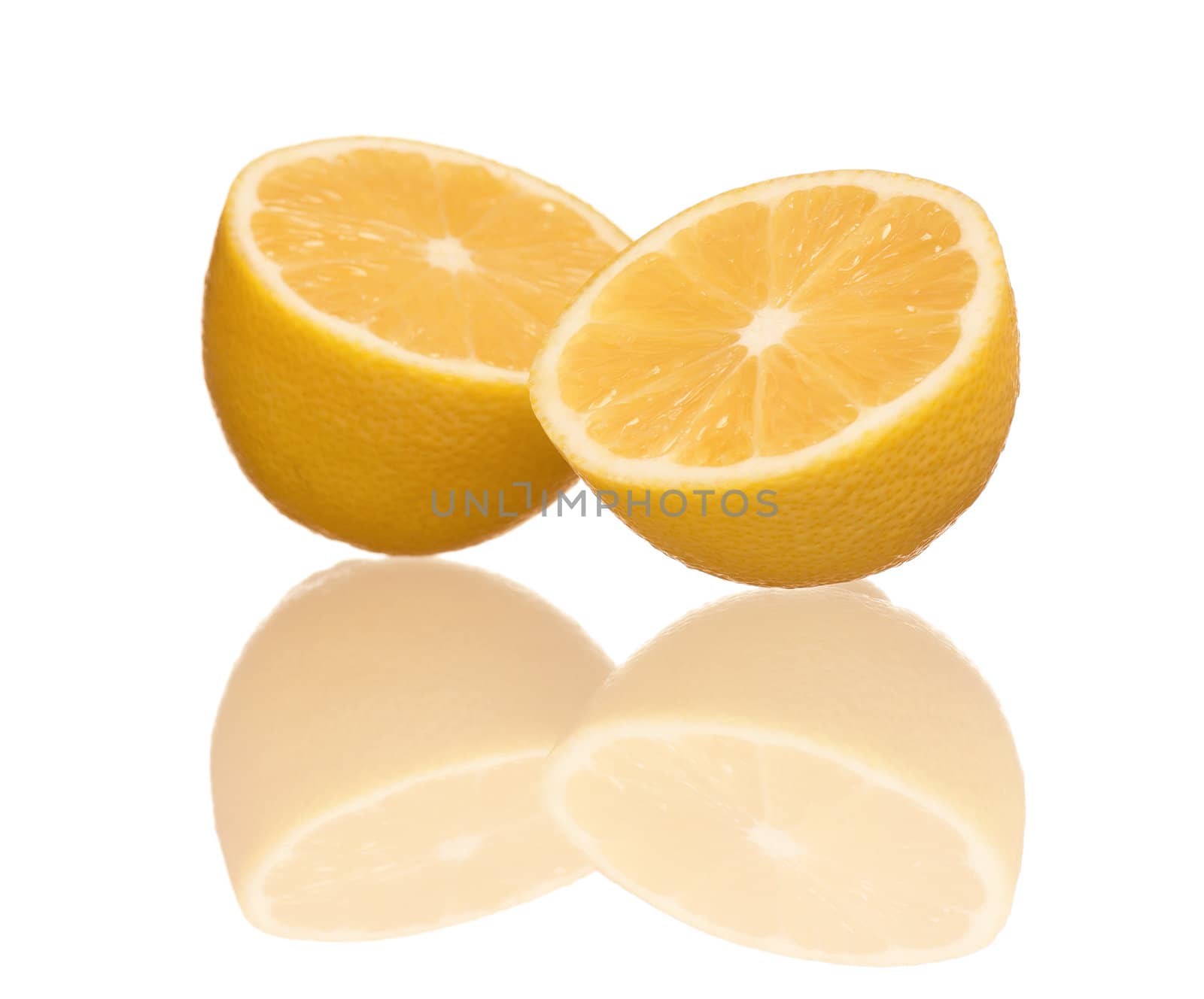 Fresh half lemon isolated on white background