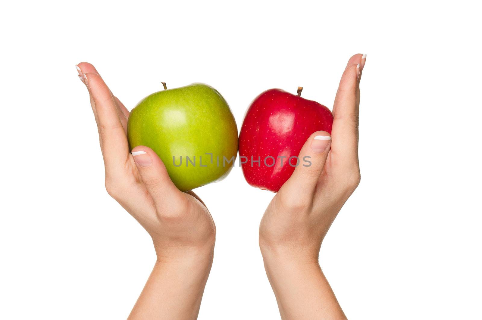 Woman hands with green and red apples isolated on white background