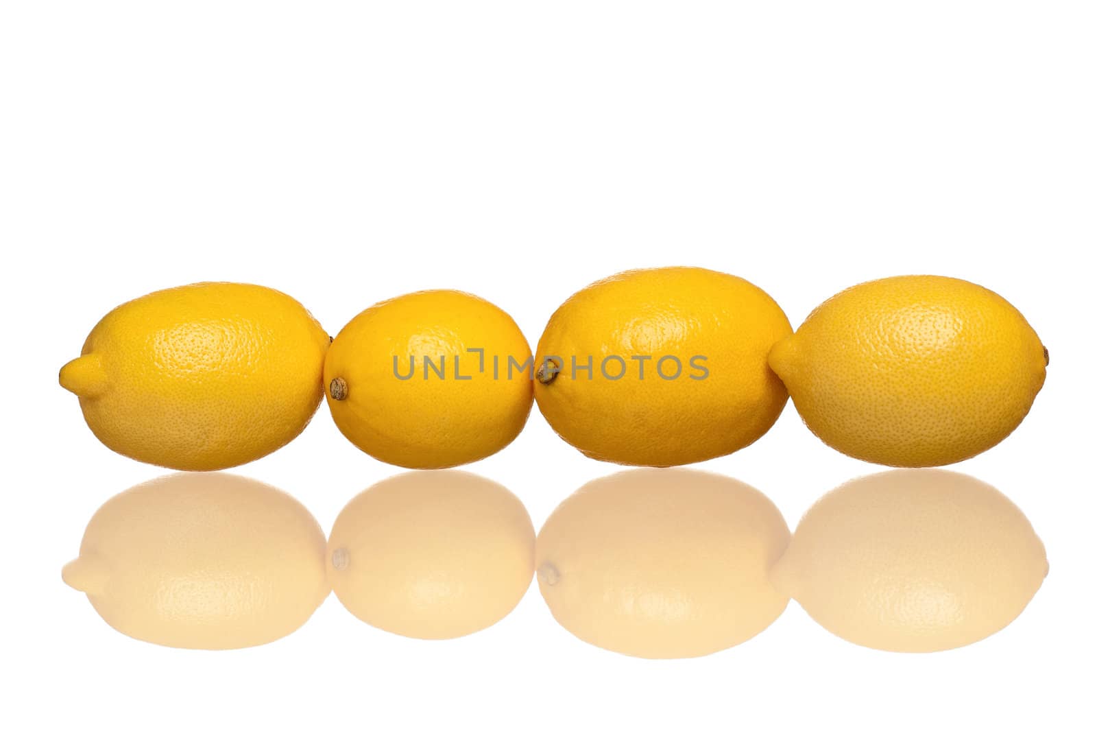 Fresh ripe lemons isolated on white background