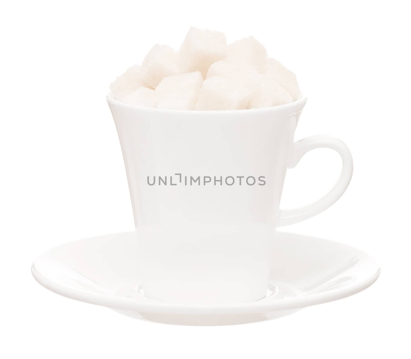 Small white cup with saucer and lump sugar isolated on white background