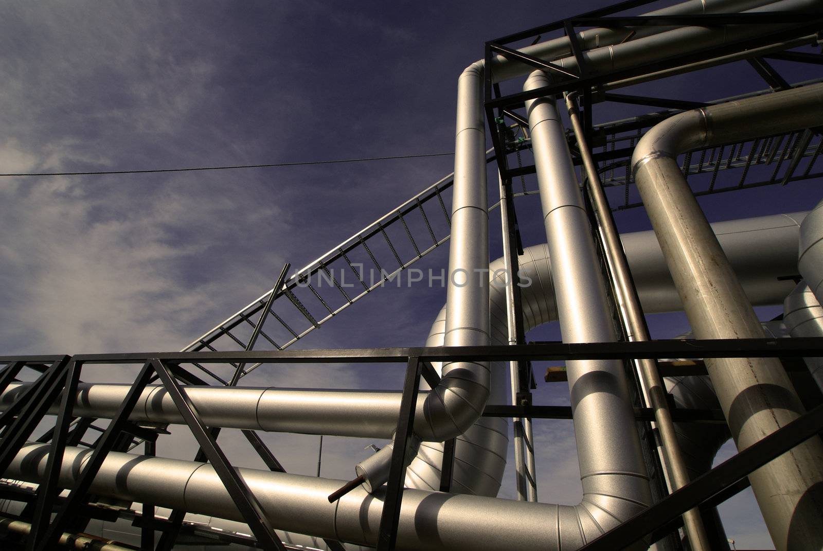 Industrial zone, Steel pipelines and cables in blue tones