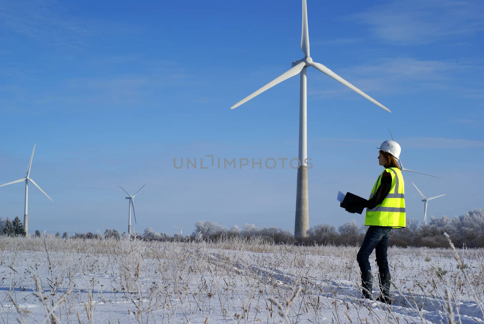 engineers with wind turbines by nostal6ie