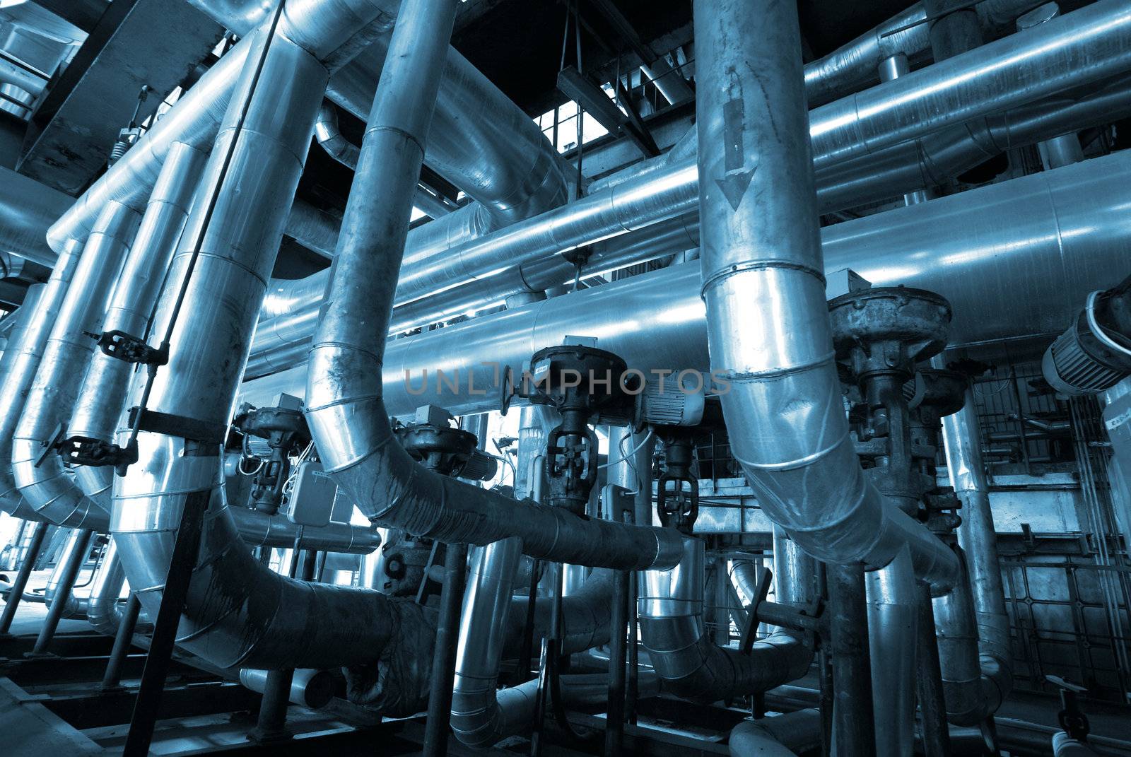 Industrial zone, Steel pipelines and cables in blue tones