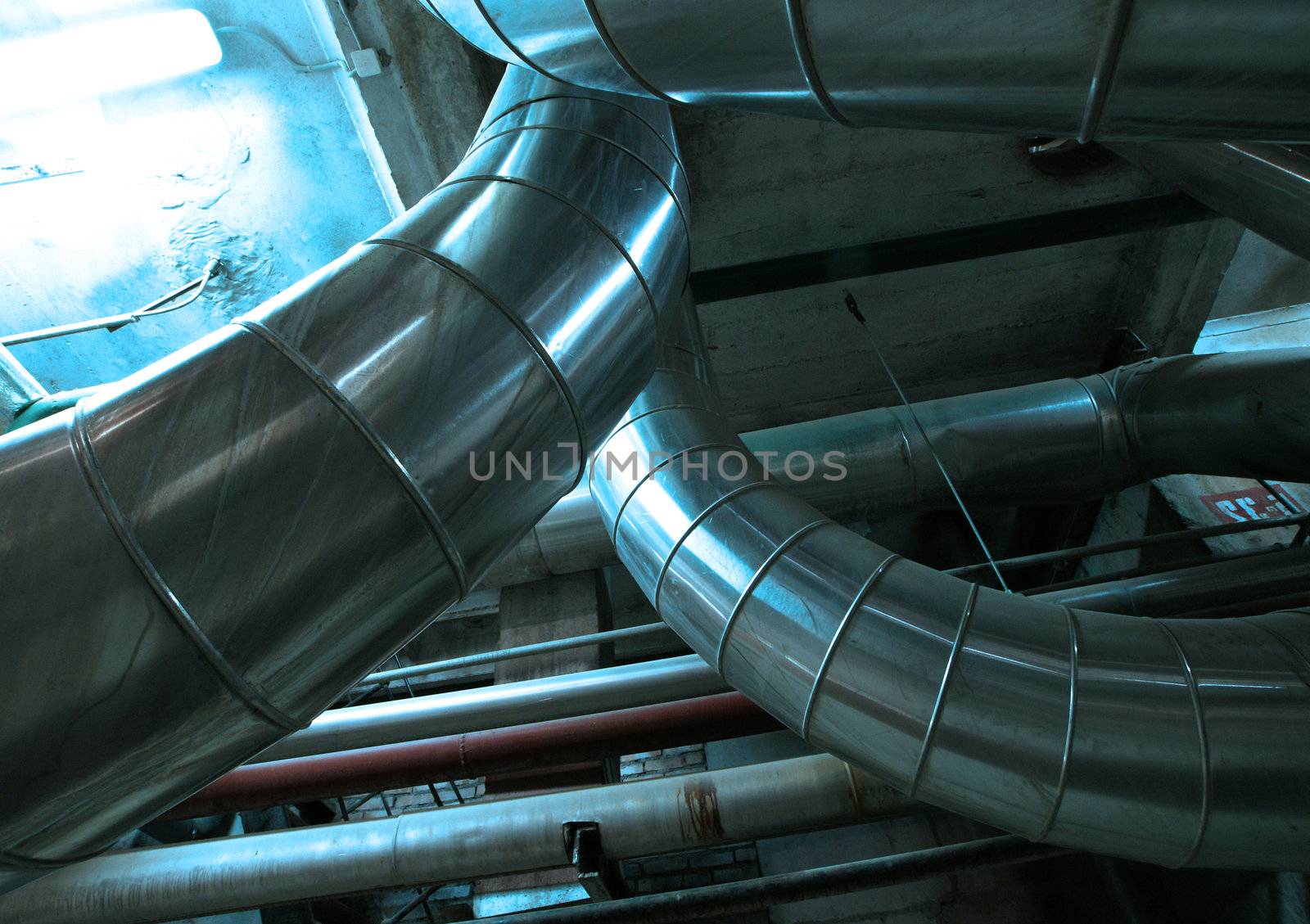 Industrial zone, Steel pipelines and cables in blue tones