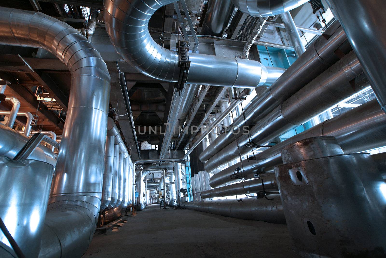 Industrial zone, Steel pipelines and cables in blue tones