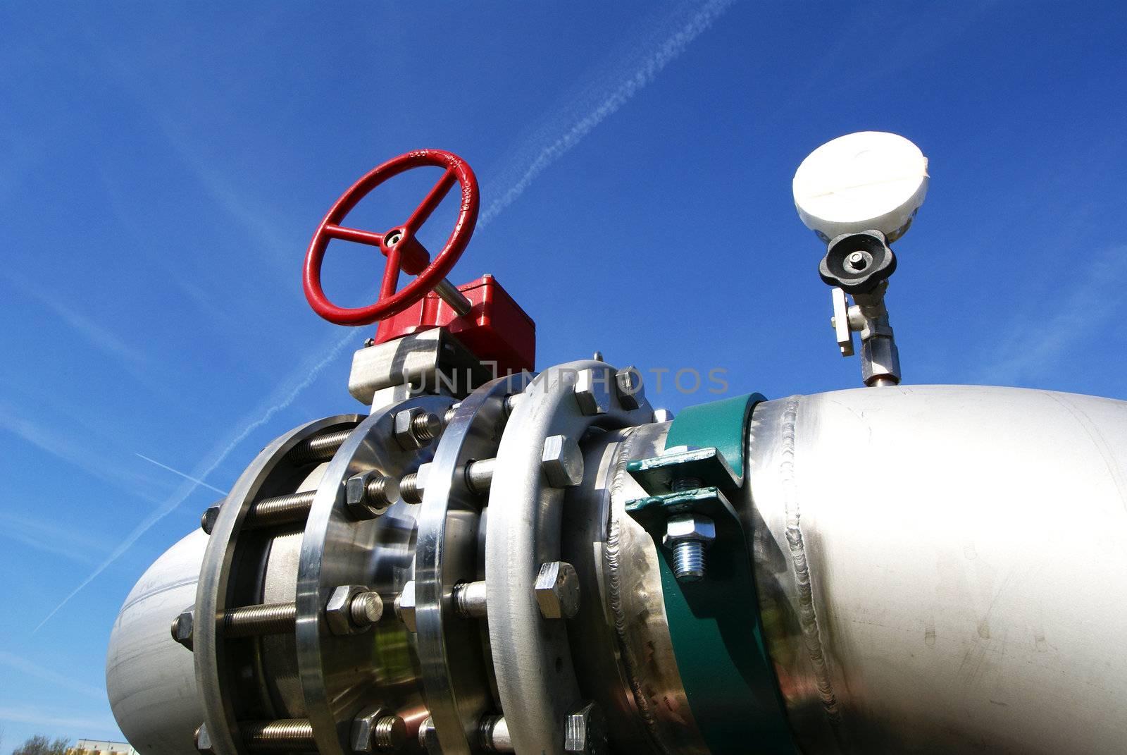 Equipment, cables and piping as found inside of  industrial power plant