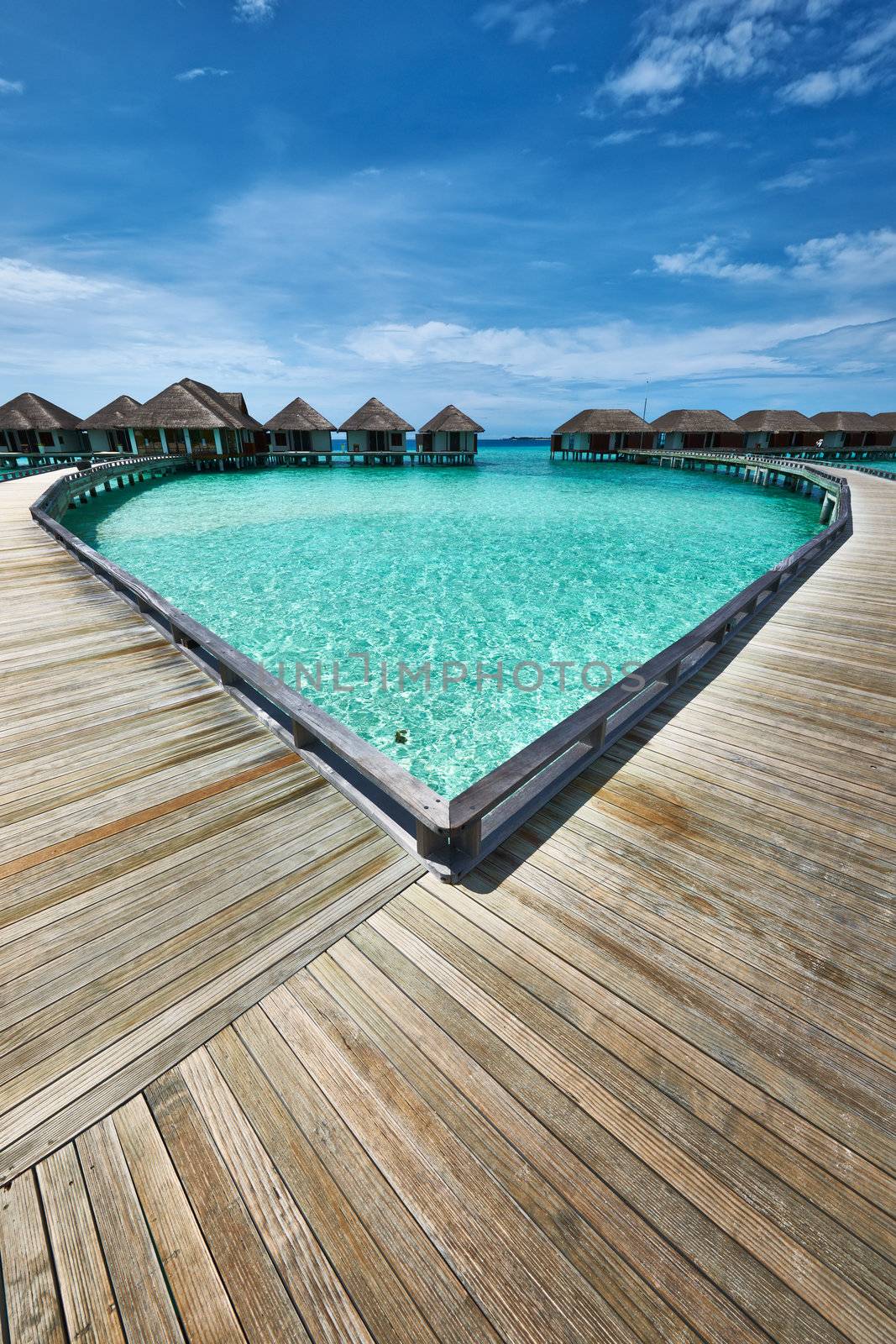 Beautiful beach with water bungalows at Maldives