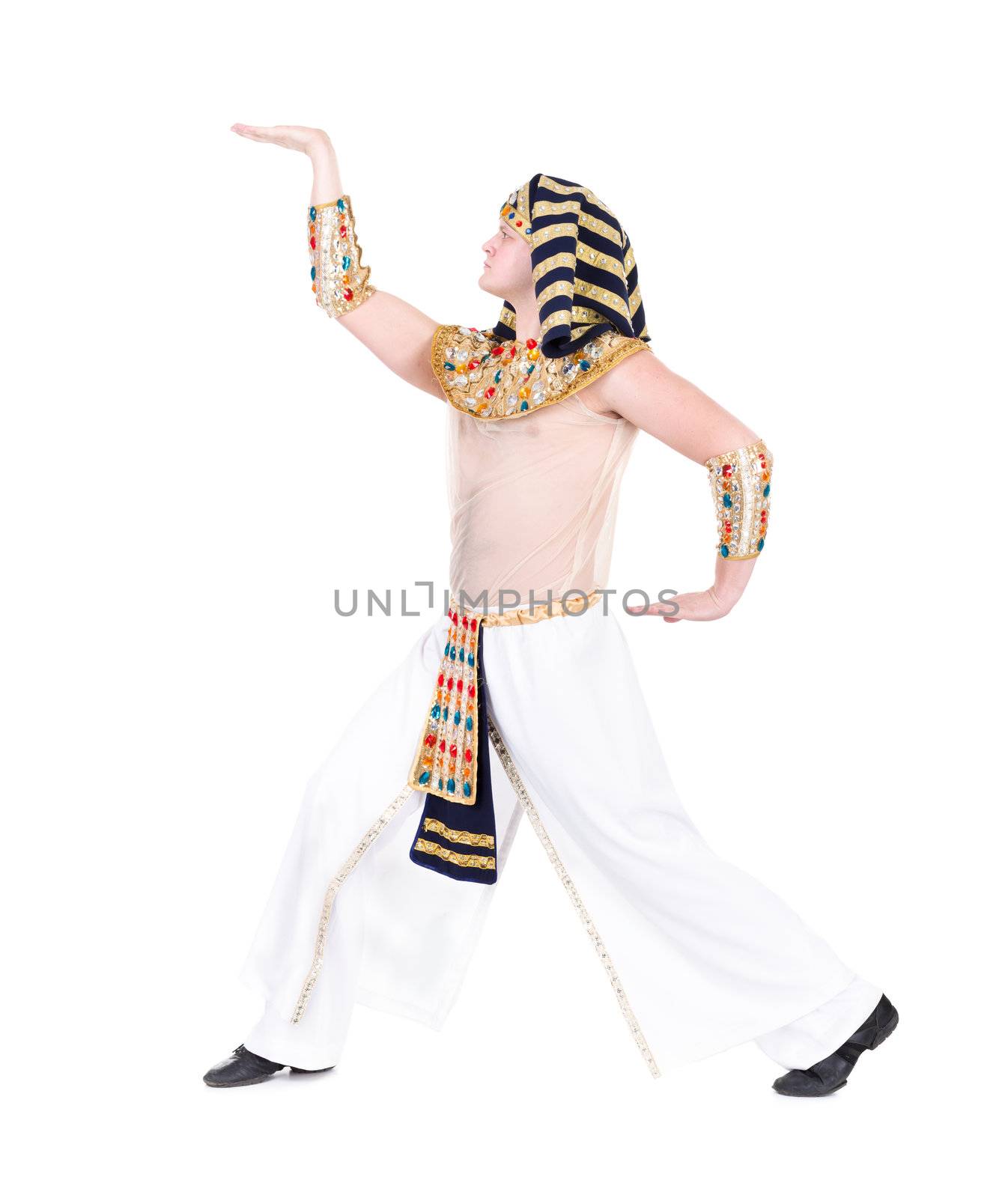 Dancing pharaoh wearing a egyptian costume. Isolated on white background in full length.