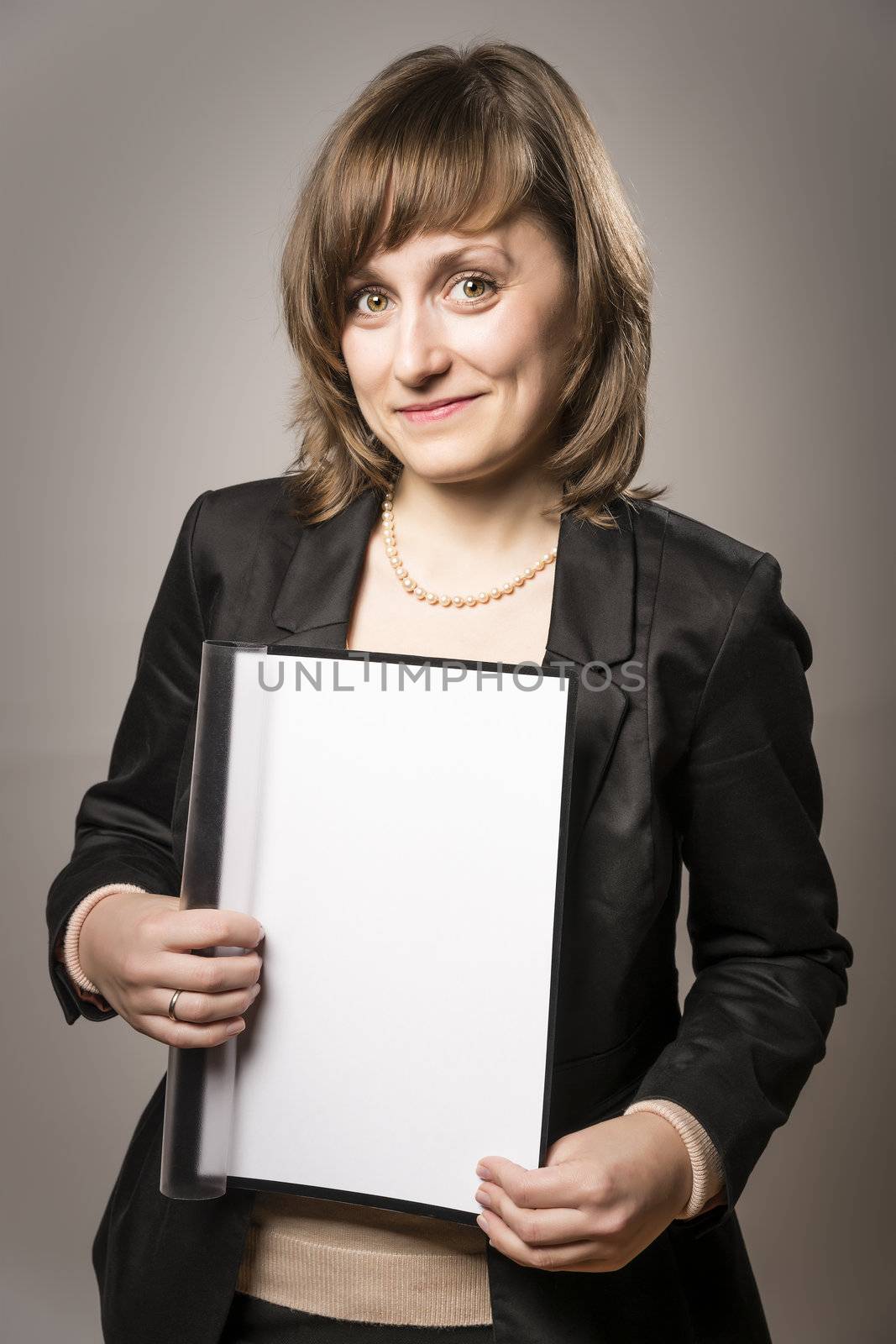 Business woman in black costume with folder