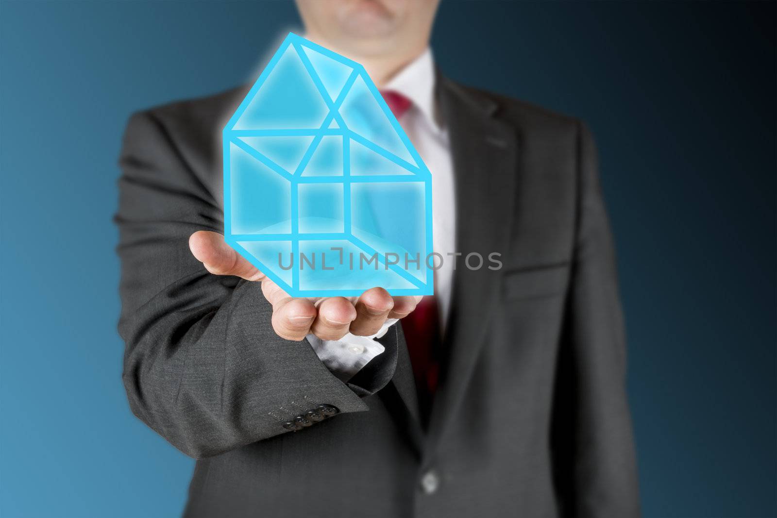 Well dressed business man is showing a illustrated blue house on his outstretched arm. Background is blue/black.