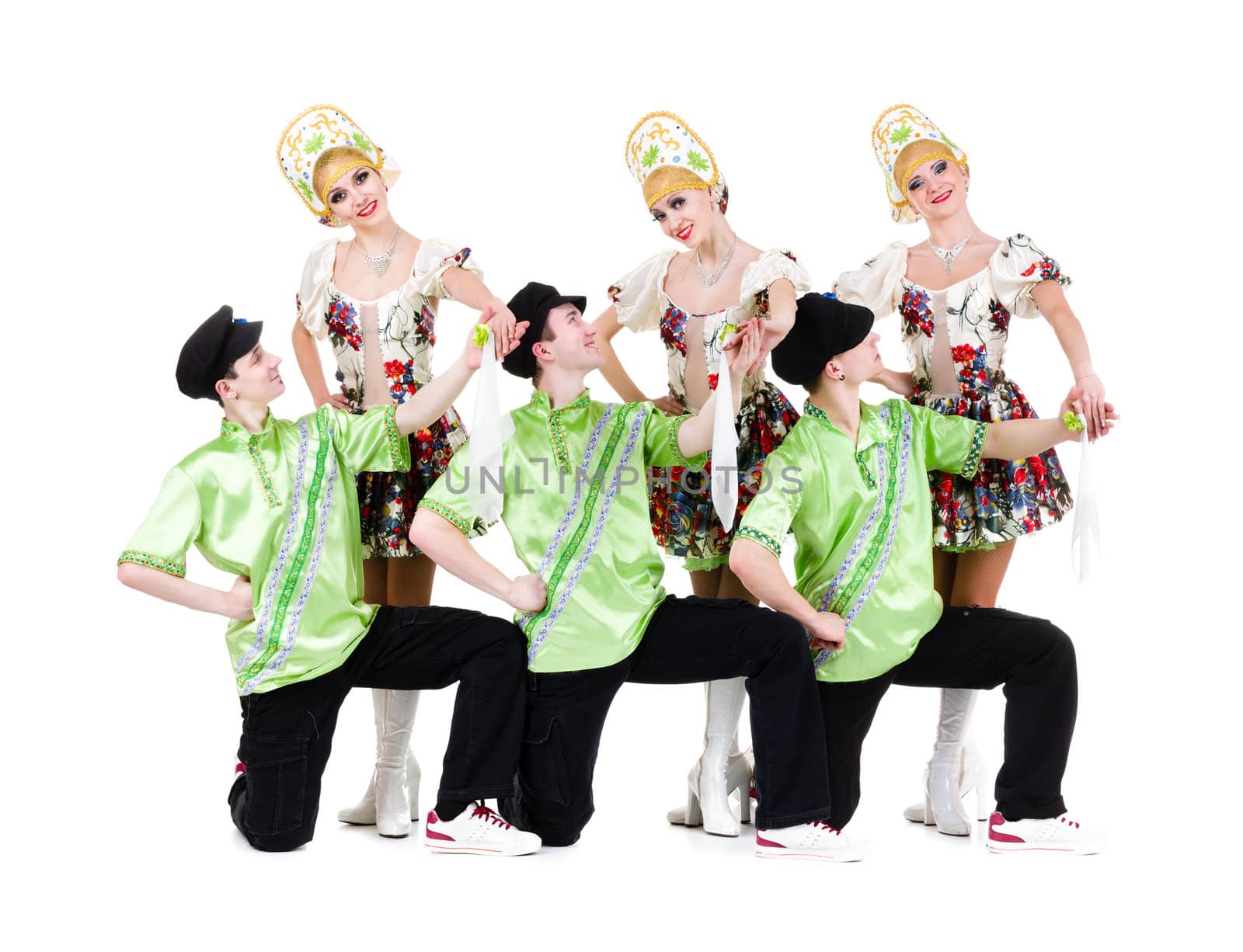 Dancer team wearing a folk ukrainian costumes dancing.  Isolated on white background in full length.