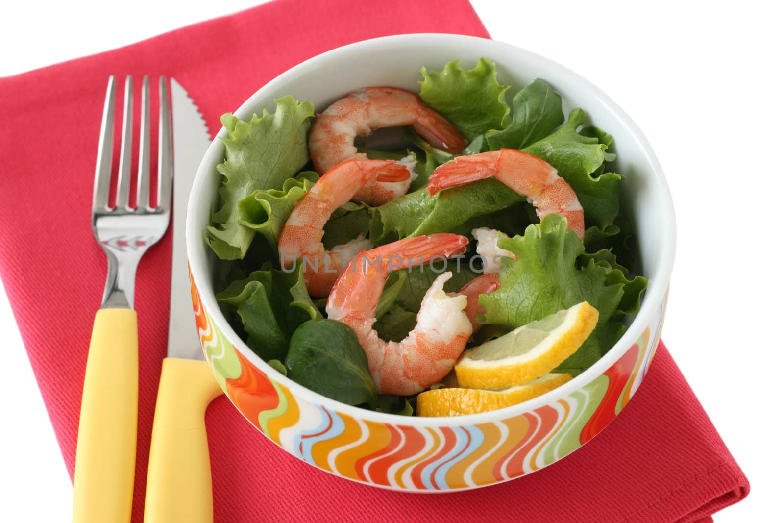 salad with shrimps in the bowl by nataliamylova