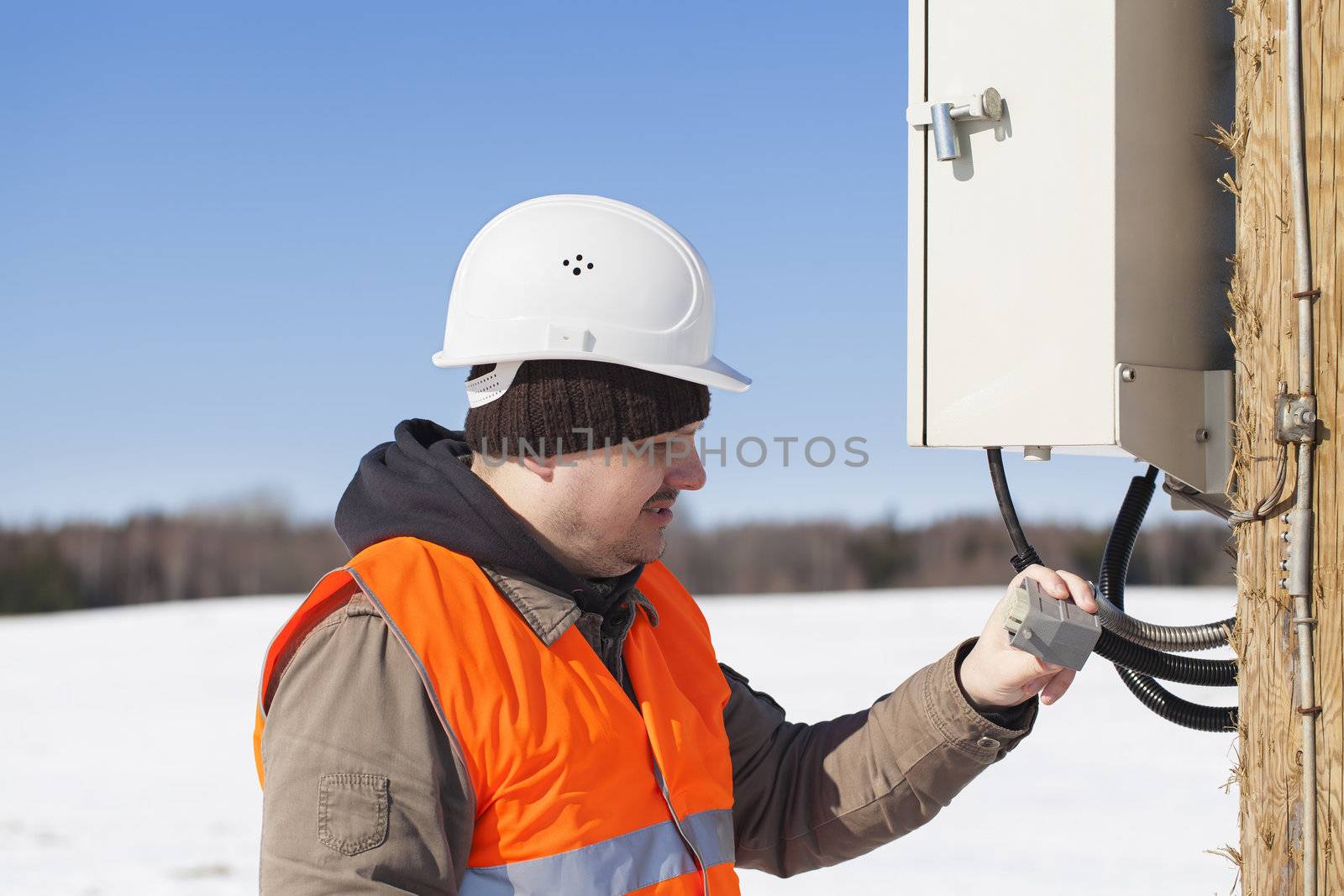 Electrical engineer inspect electric lines  technical quality