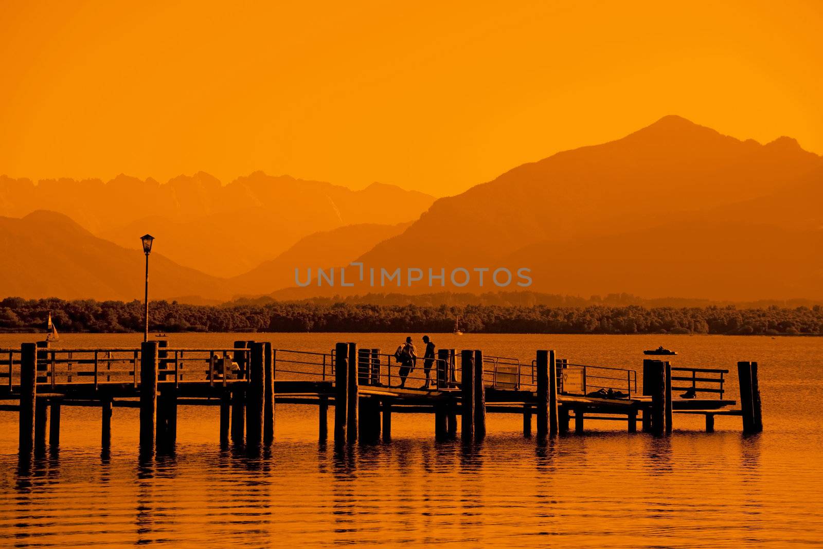 Eveningmood at Chiemsee with red sunlight