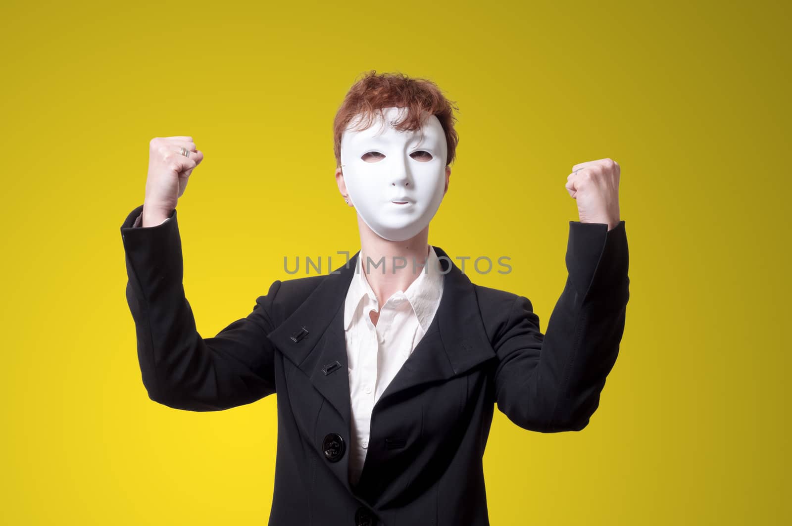 strong business woman with white mask on yellow background