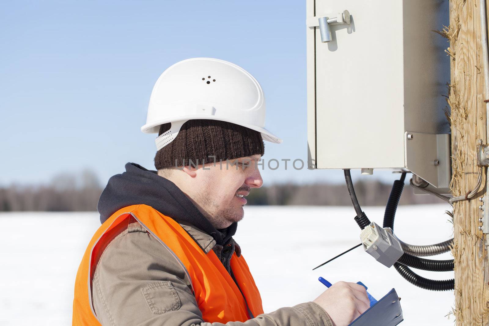 Electrical engineer inspect electric lines