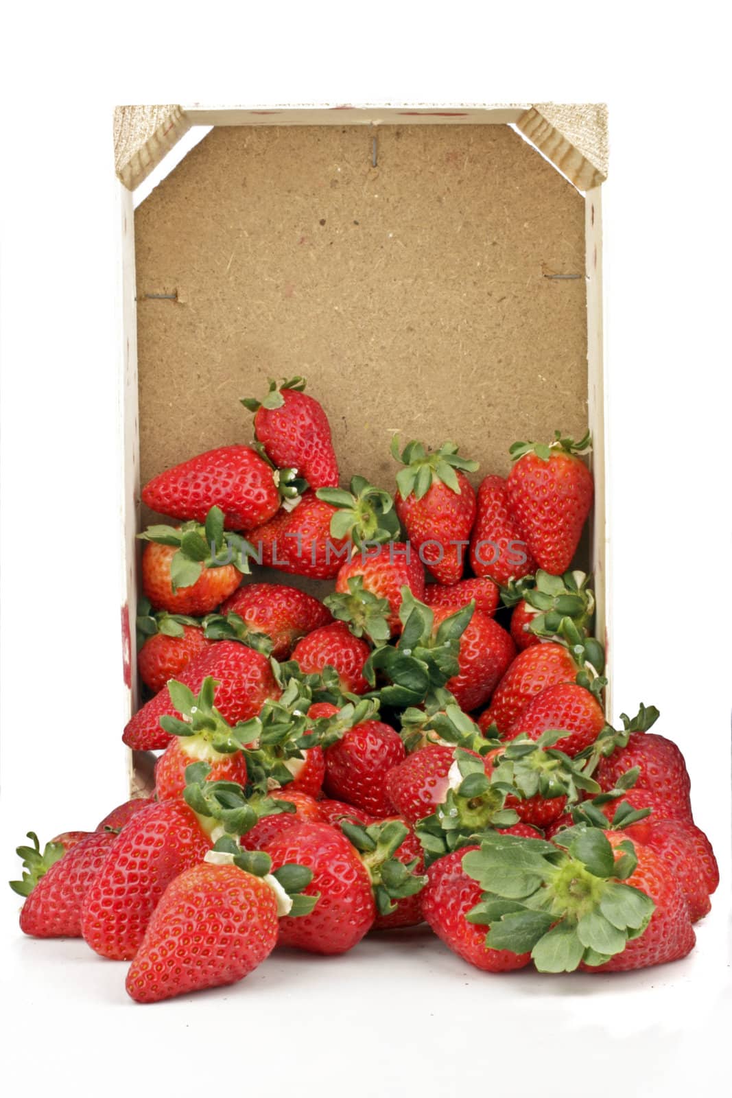 Bpx with strawberries on a white background