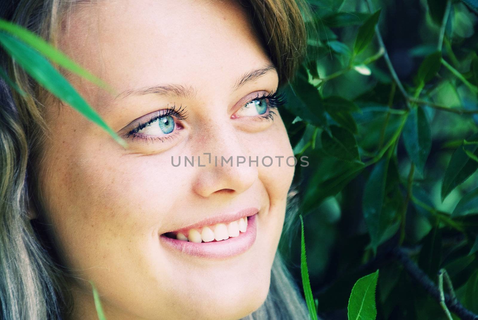 portrait of beautiful young women in nature