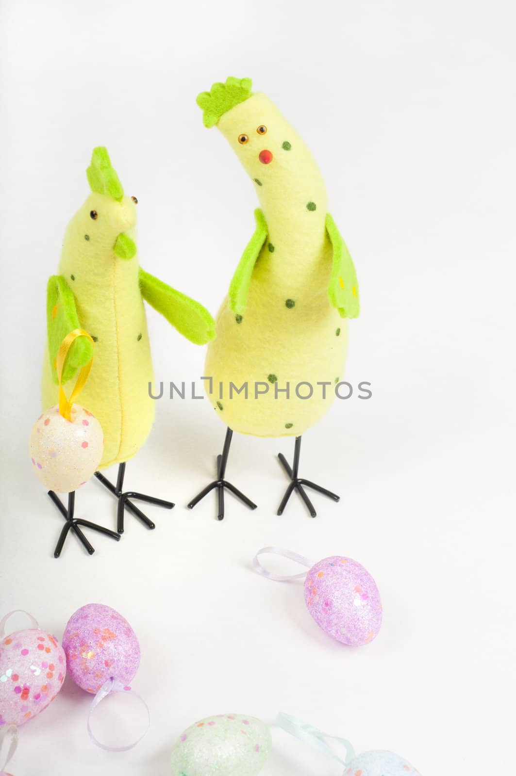Easter chicken family with eggs on light background