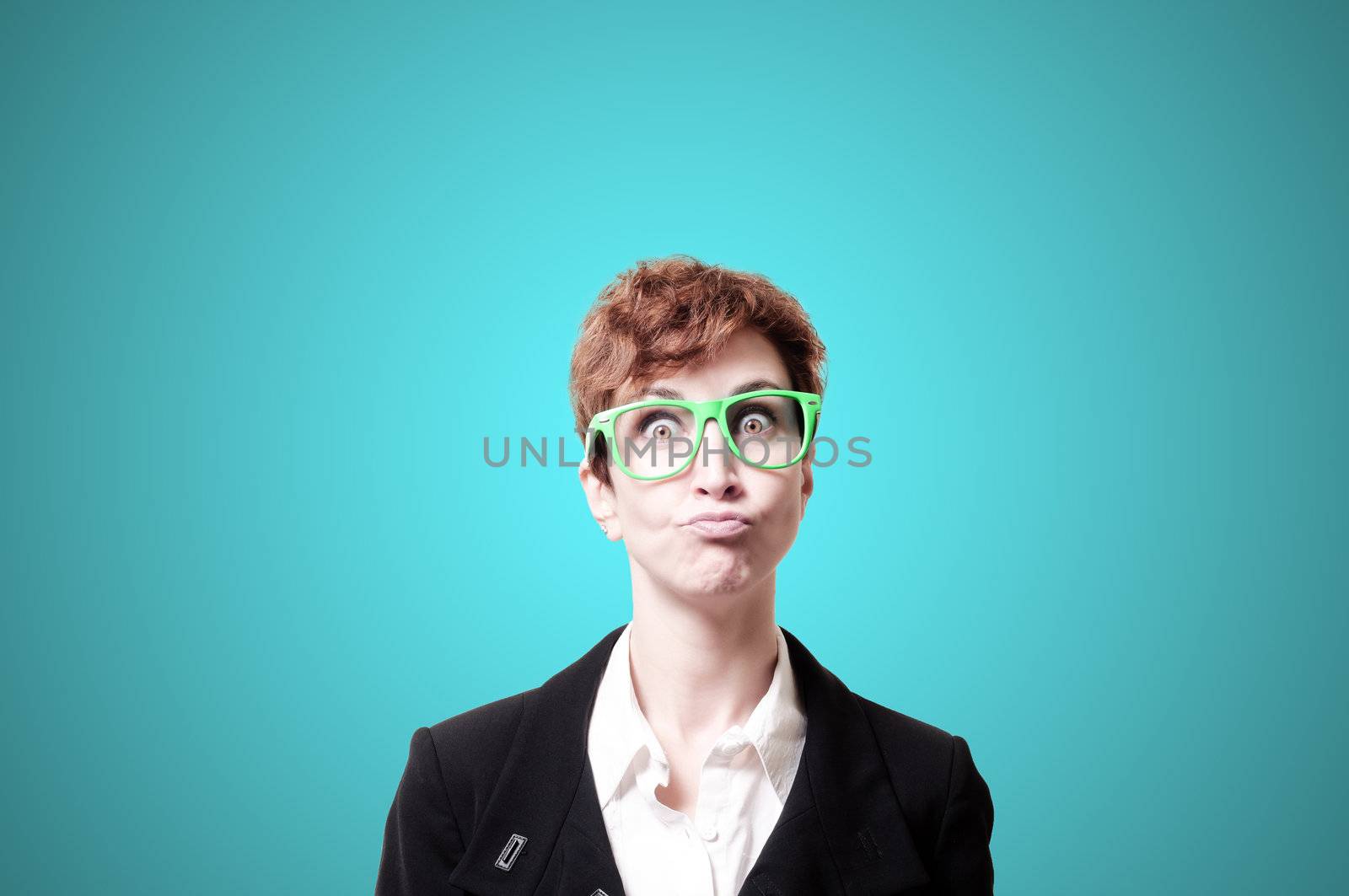 funny business woman with green eyeglasses on blue background