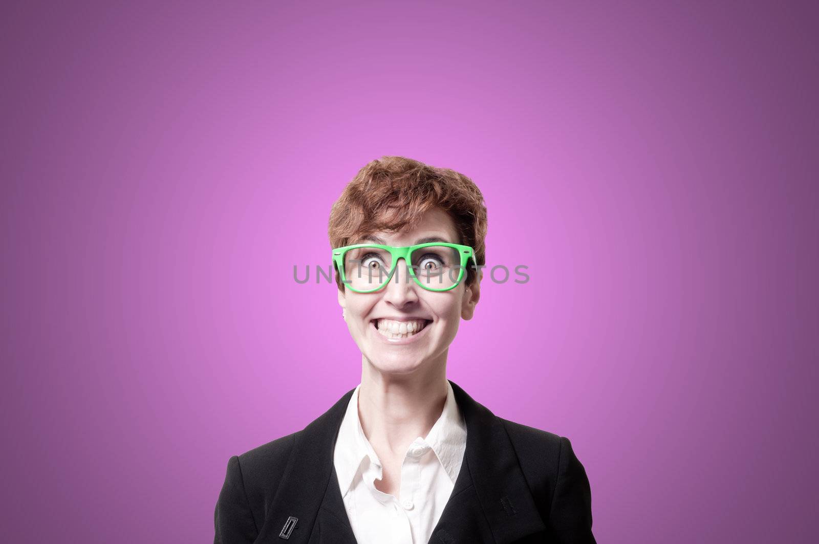 funny business woman with green eyeglasses on pink background
