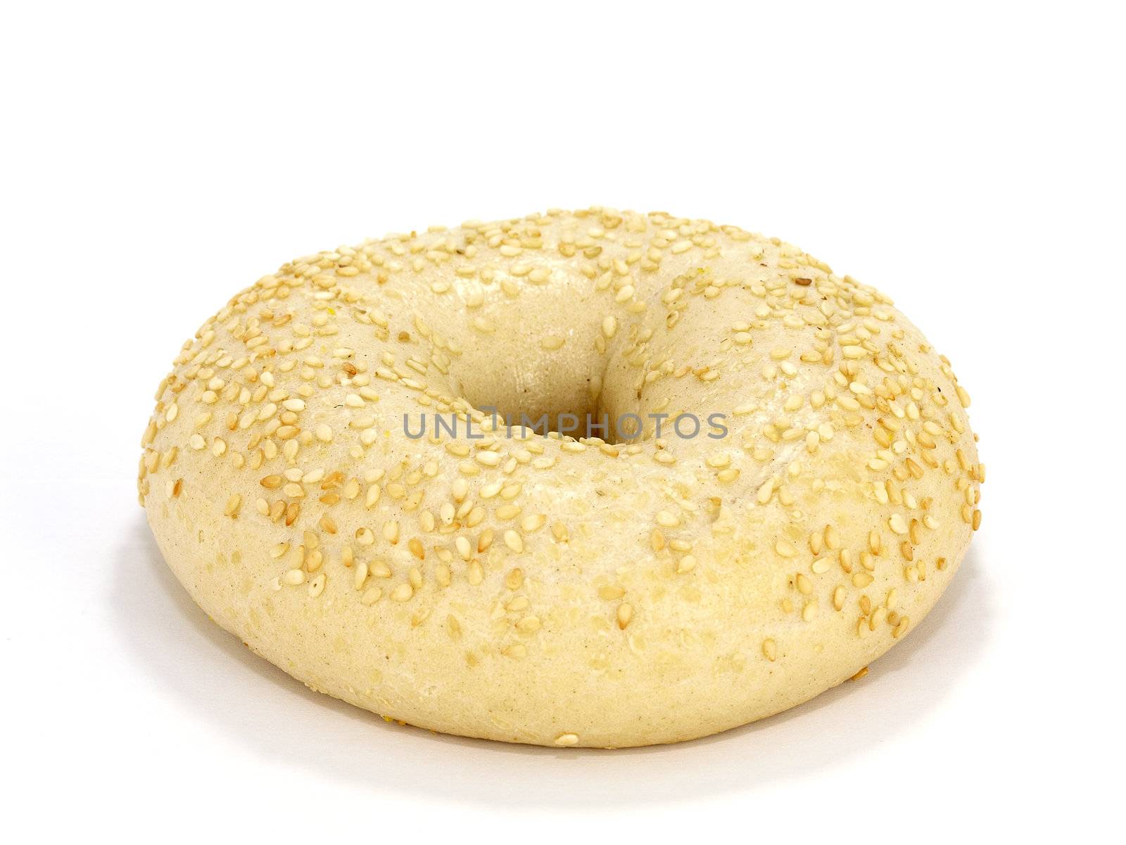 single sesame seed bagel on white background