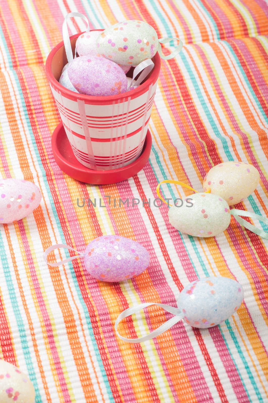 Striped napkin and easter eggs on the napkin