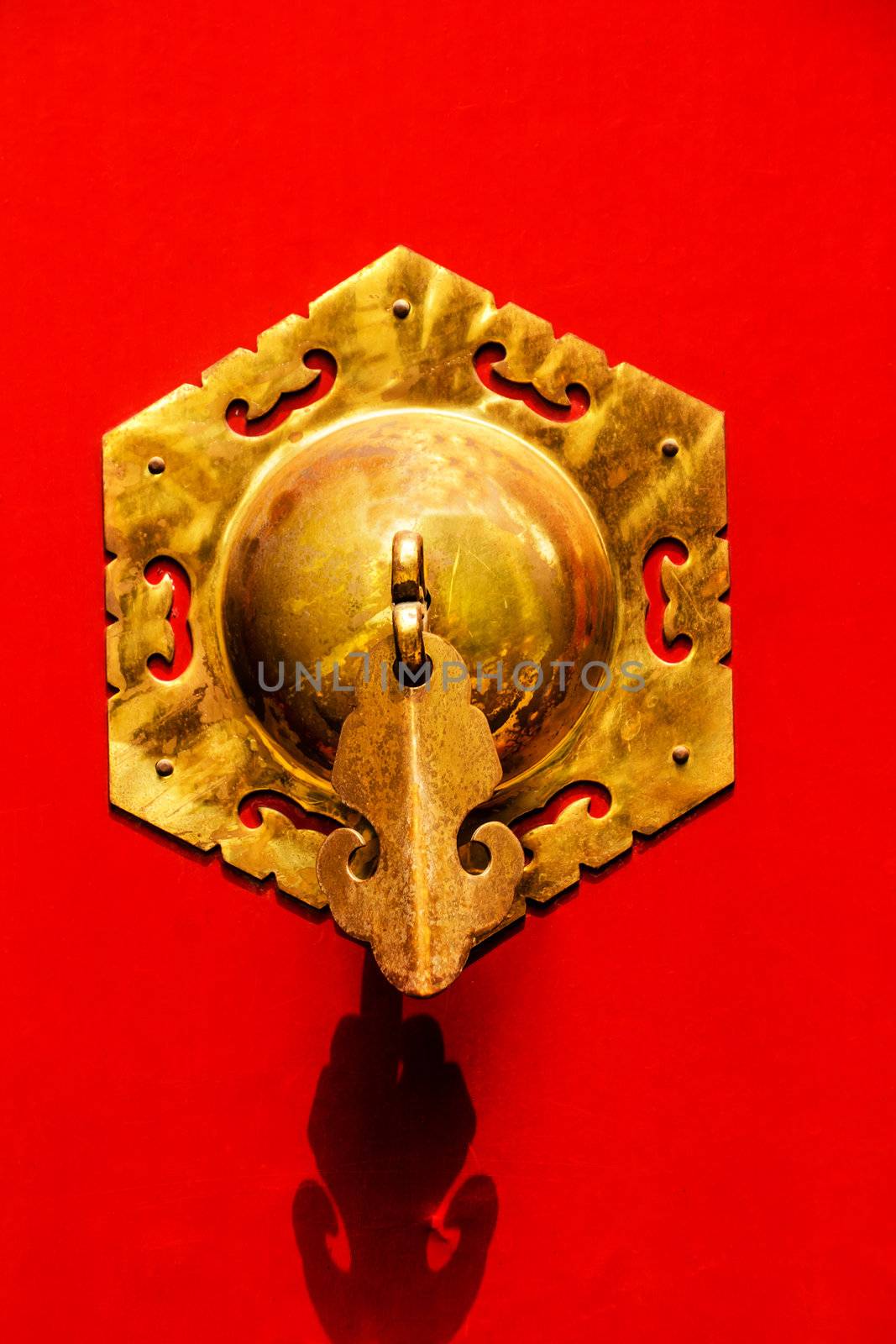 Red Door Ornate Brass Knocker, one of the symbols of China, Houhai Lake, Beijing