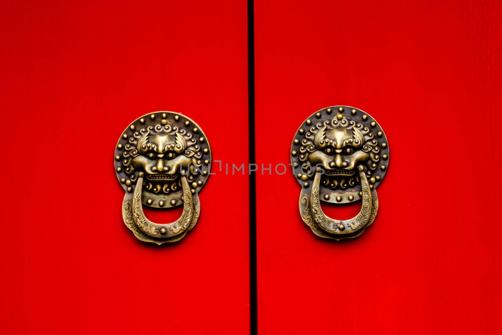 Red Door Ornate Dragon Brass Knockers, one of the symbols of China, Houhai Lake, Beijing