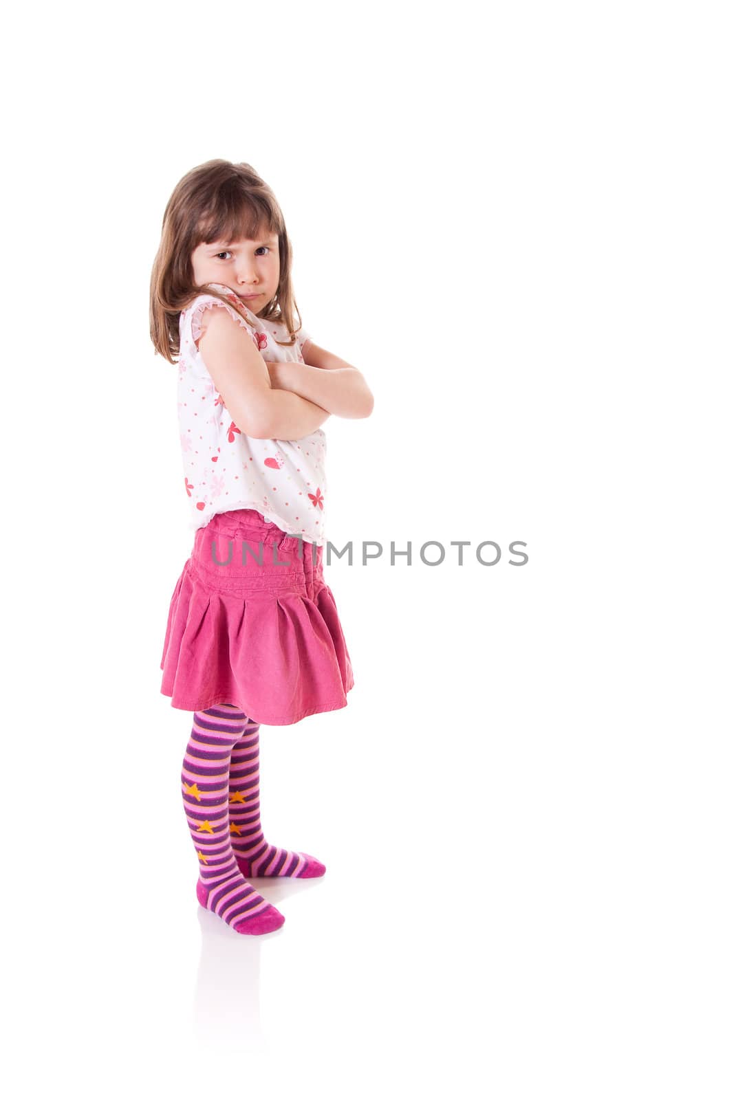 Cute little girl in a bad-tempered mood