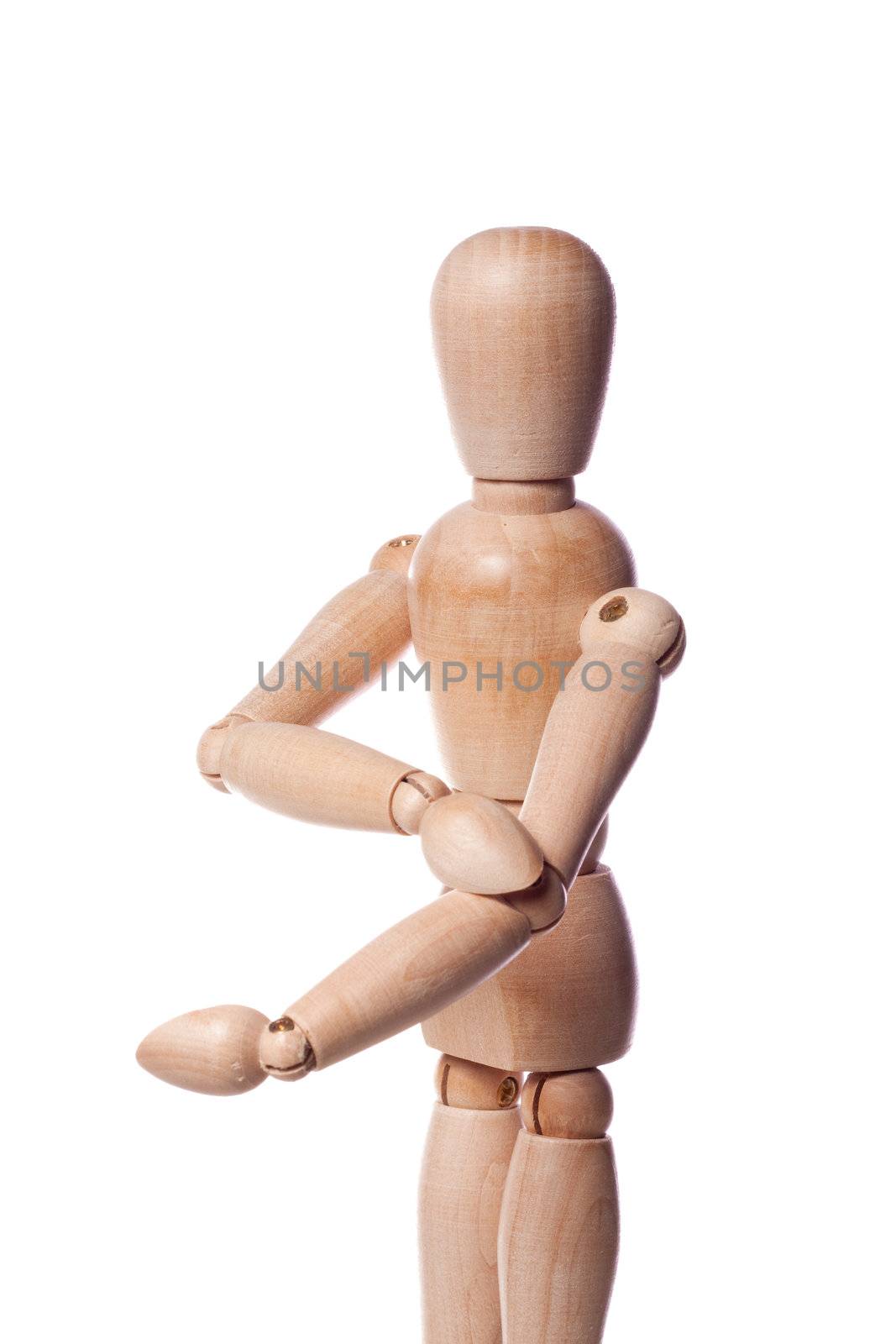 Wooden puppet with elbow pain