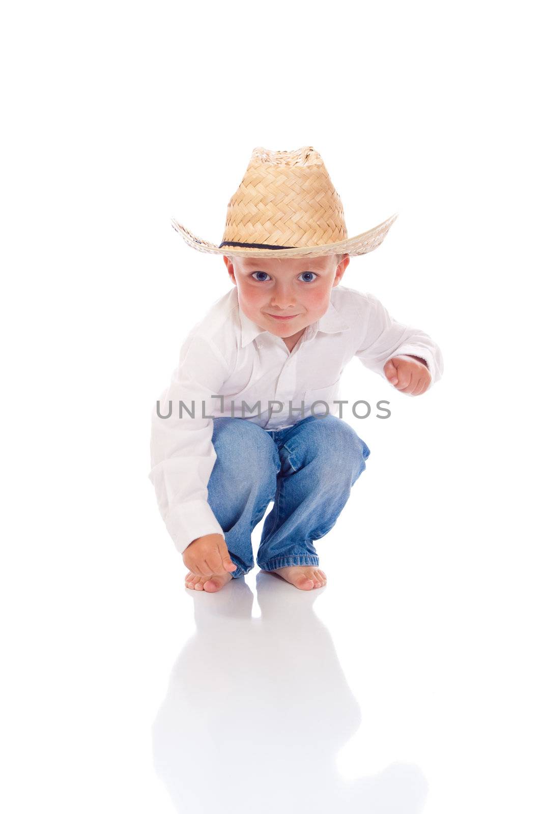 Little boy with a hat playing