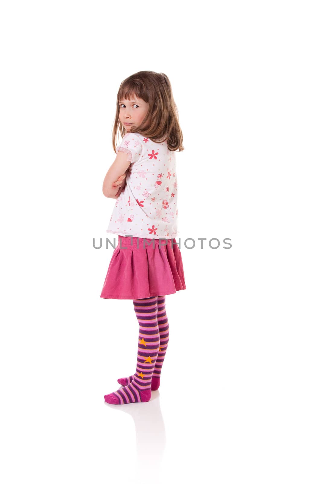 Cute little girl in a bad-tempered mood