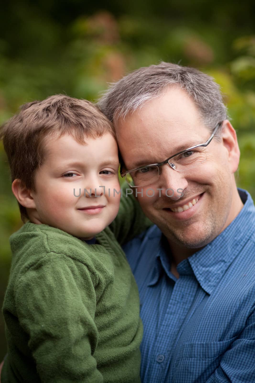 Father and son smiling by Talanis