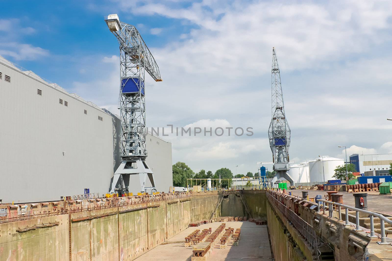 Crane near a covered dry dock at the shipyard